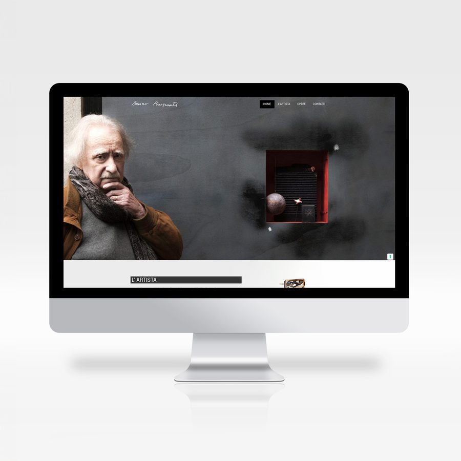 Website of artist Bruno Raspanti on a monitor: dark homepage with a portrait and a red artwork
