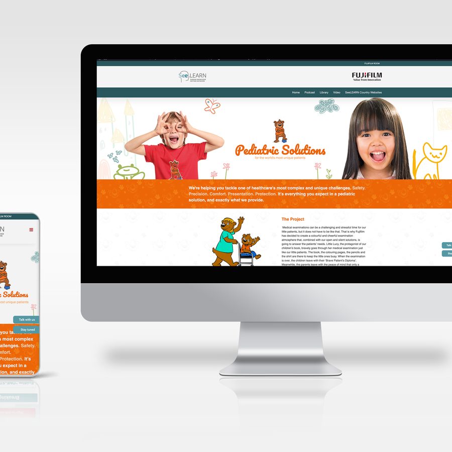 Fujifilm SeeLEARN Pediatric Solutions website on a monitor and smartphone, with smiling children and colourful illustrations